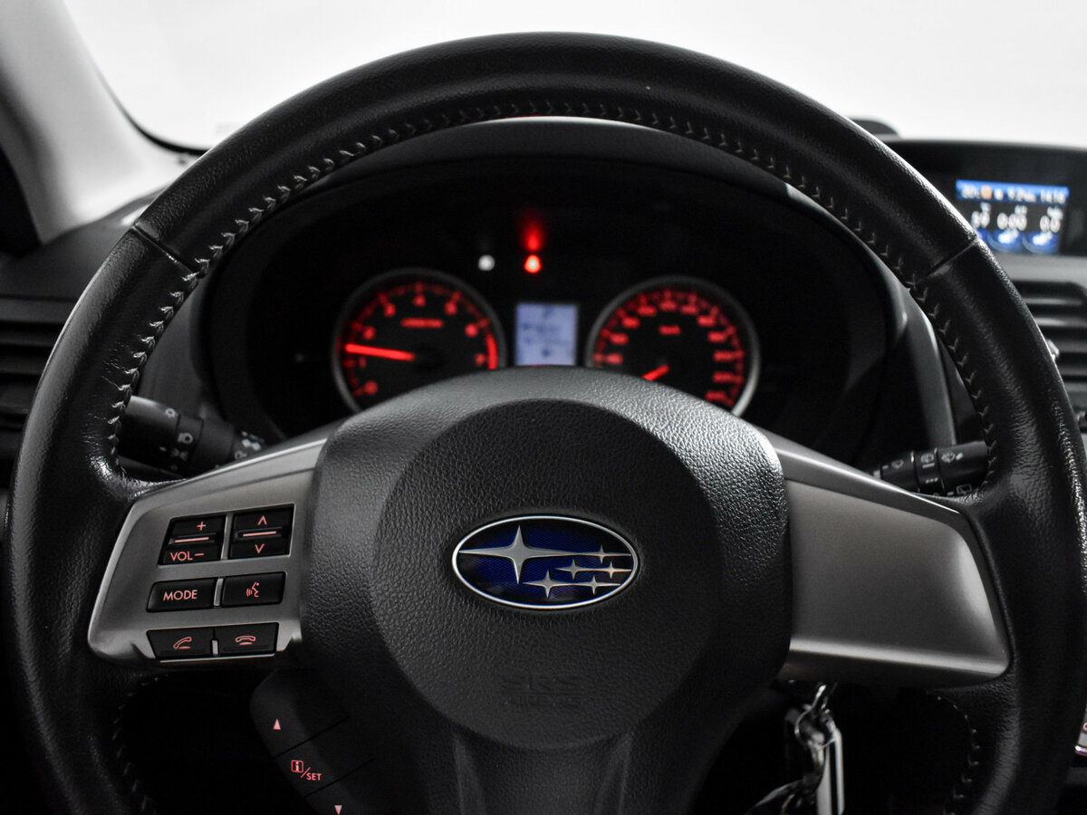 Subaru Forester 2014 года с пробегом. Фото: #14