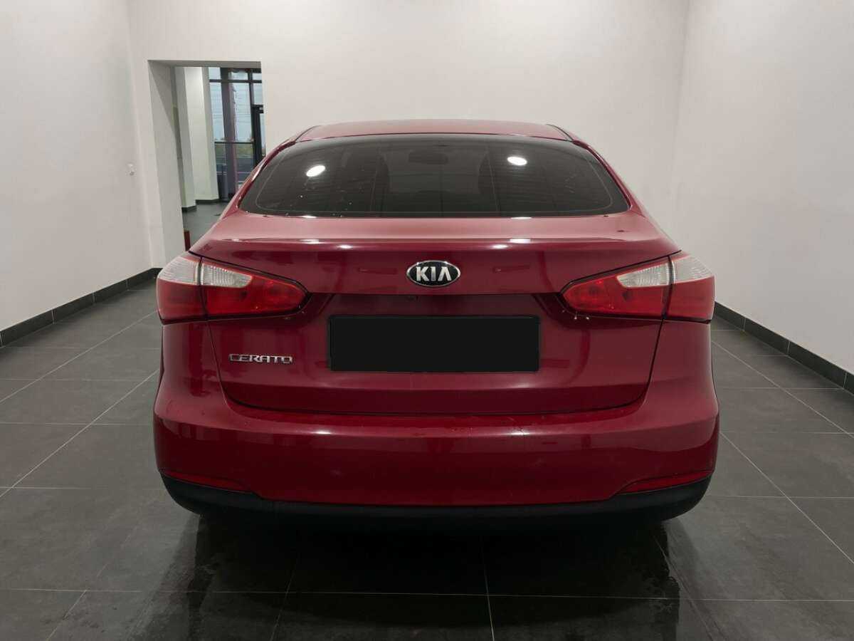 Kia Cerato 2013 года с пробегом. Фото: #3