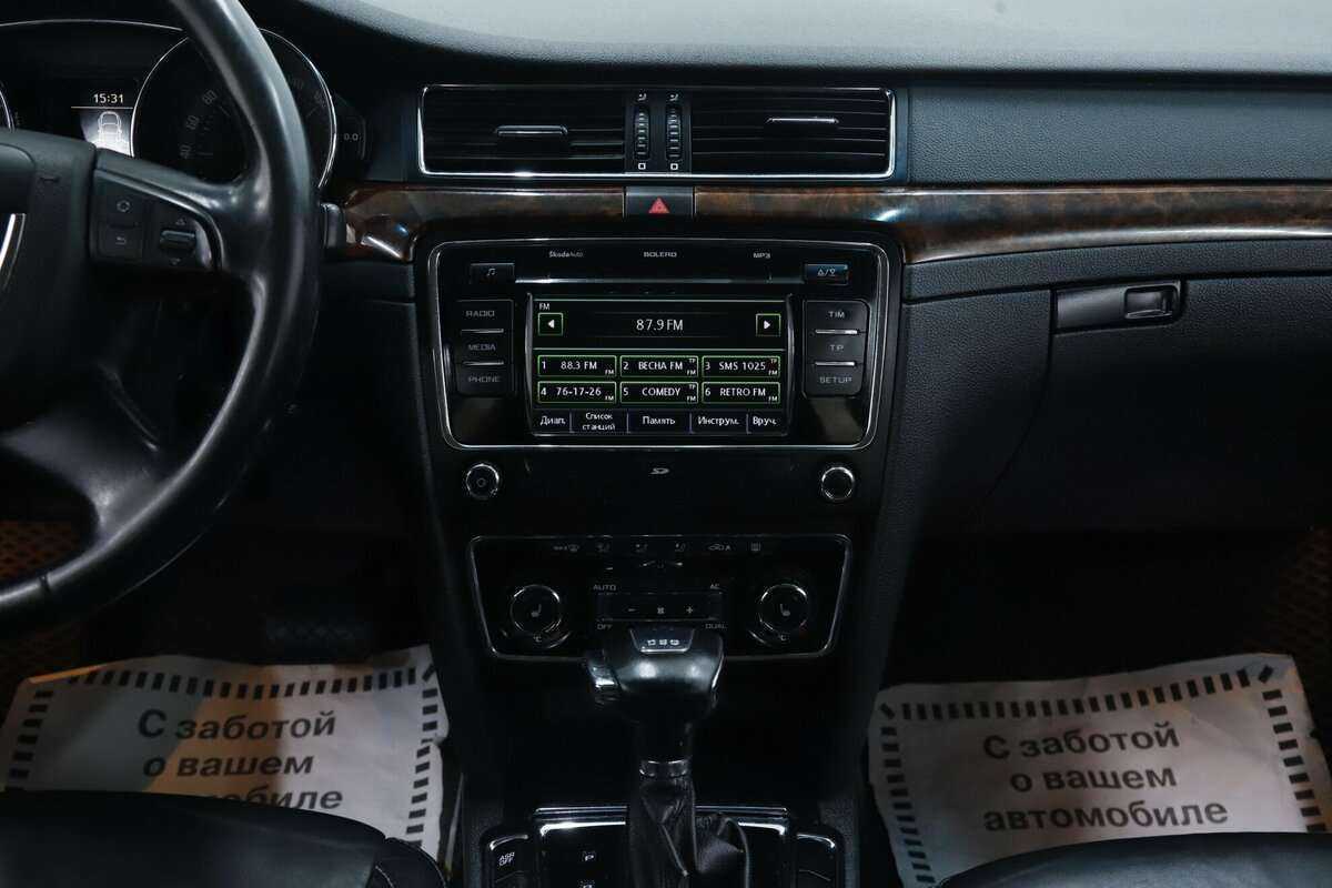 Skoda Superb 2013 года с пробегом. Фото: #13