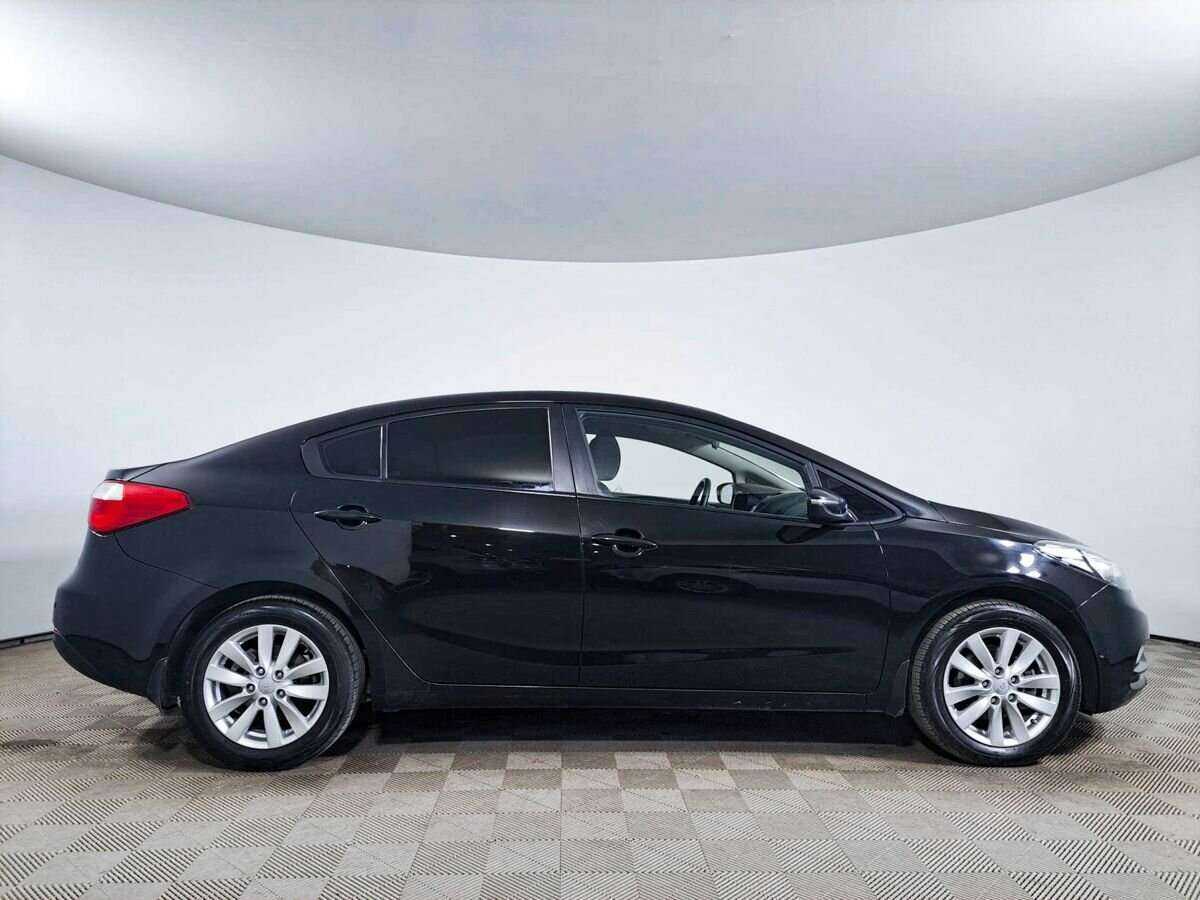 Kia Cerato 2014 года с пробегом. Фото: #3