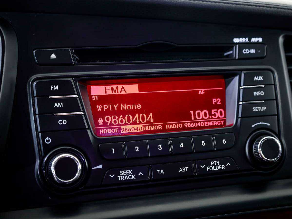 Kia Optima 2013 года с пробегом. Фото: #13