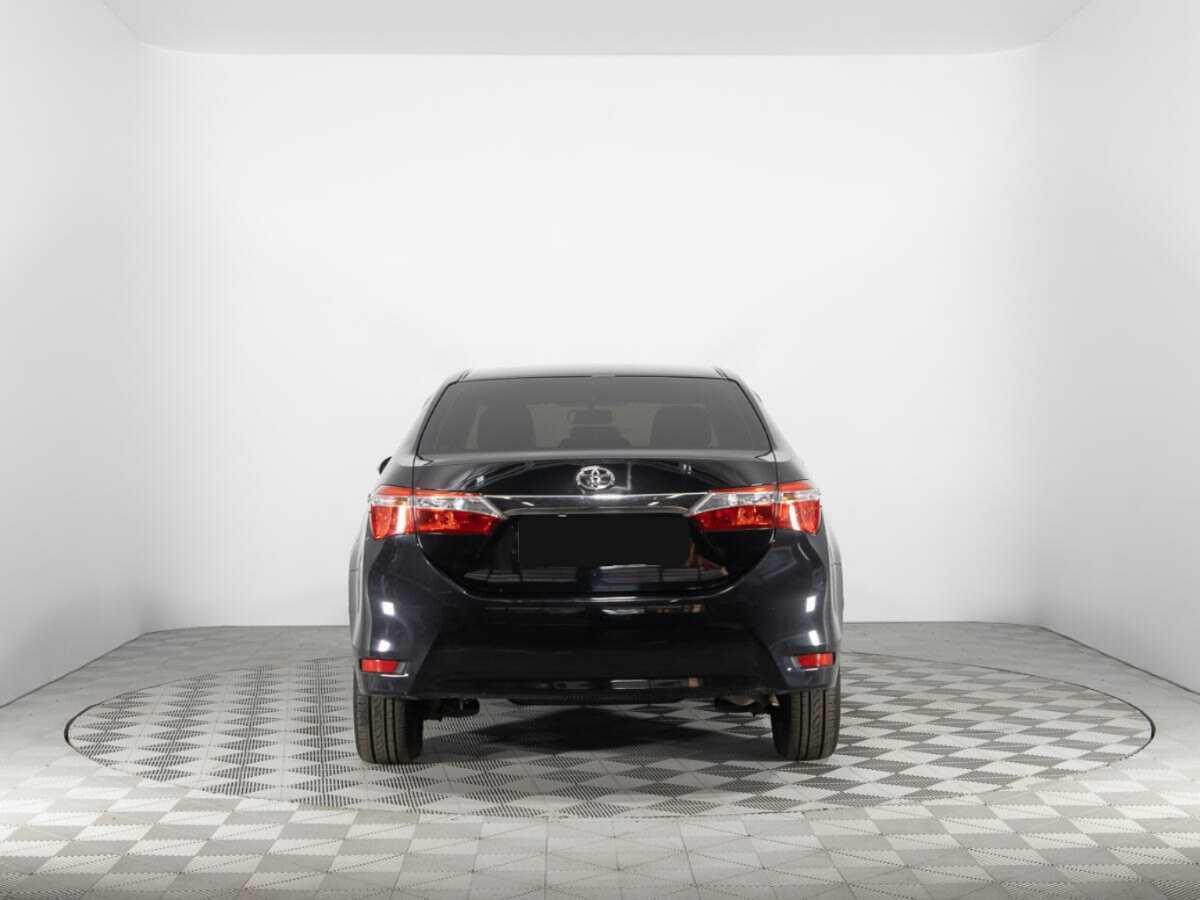 Toyota Corolla 2014 года с пробегом. Фото: #5