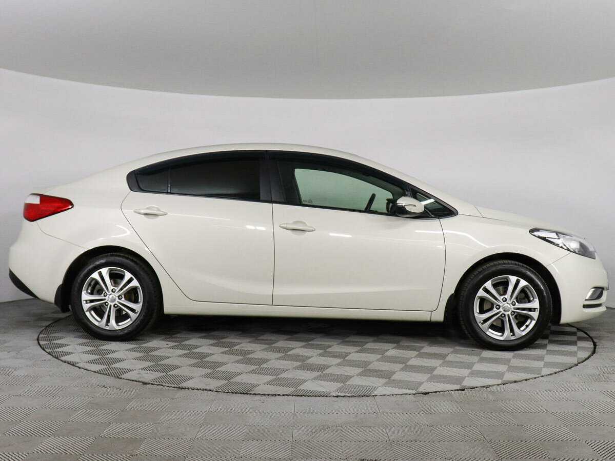 Kia Cerato 2013 года с пробегом. Фото: #3