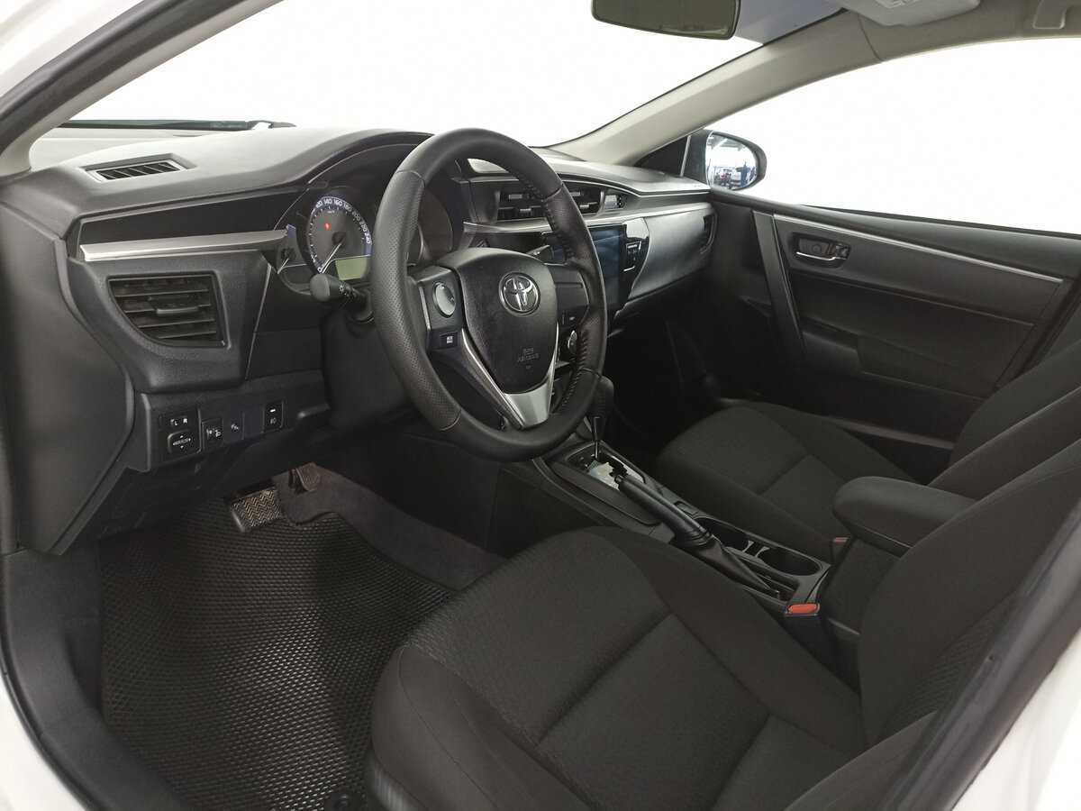 Toyota Corolla 2013 года с пробегом. Фото: #15