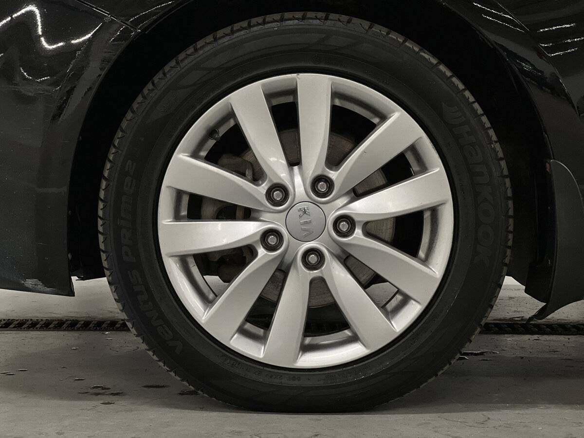 Kia Cerato 2014 года с пробегом. Фото: #17