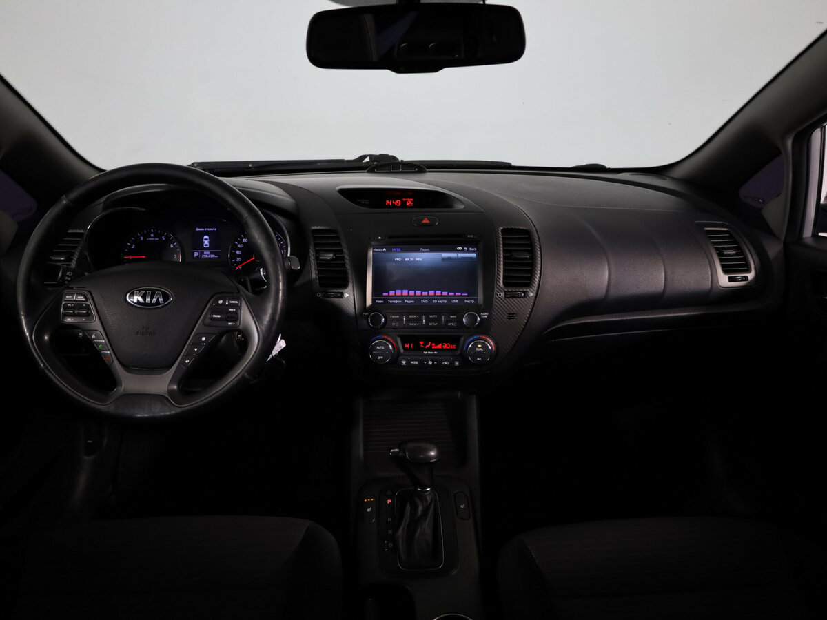 Kia Cerato 2013 года с пробегом. Фото: #8